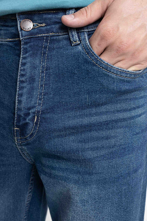 The Mid Wash Tapered Fit Jeans