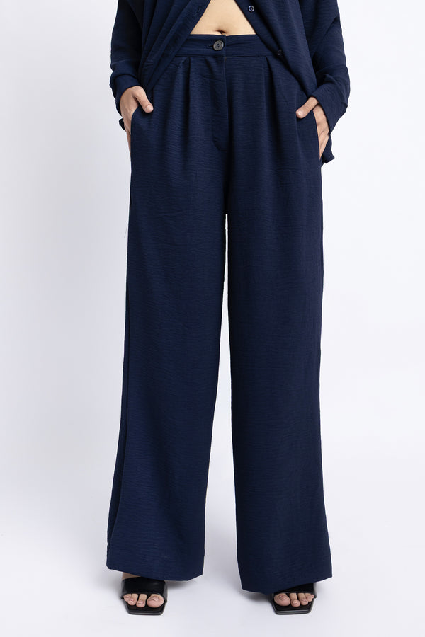 The Navy Wide Leg Pleated Trousers