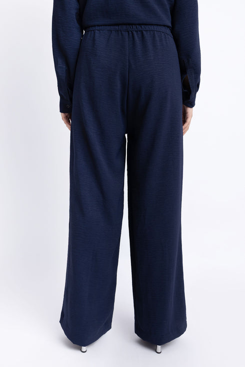 The Navy Wide Leg Pleated Trousers