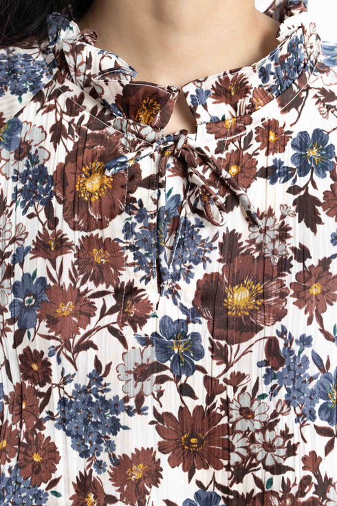 The Floral Peplum Top