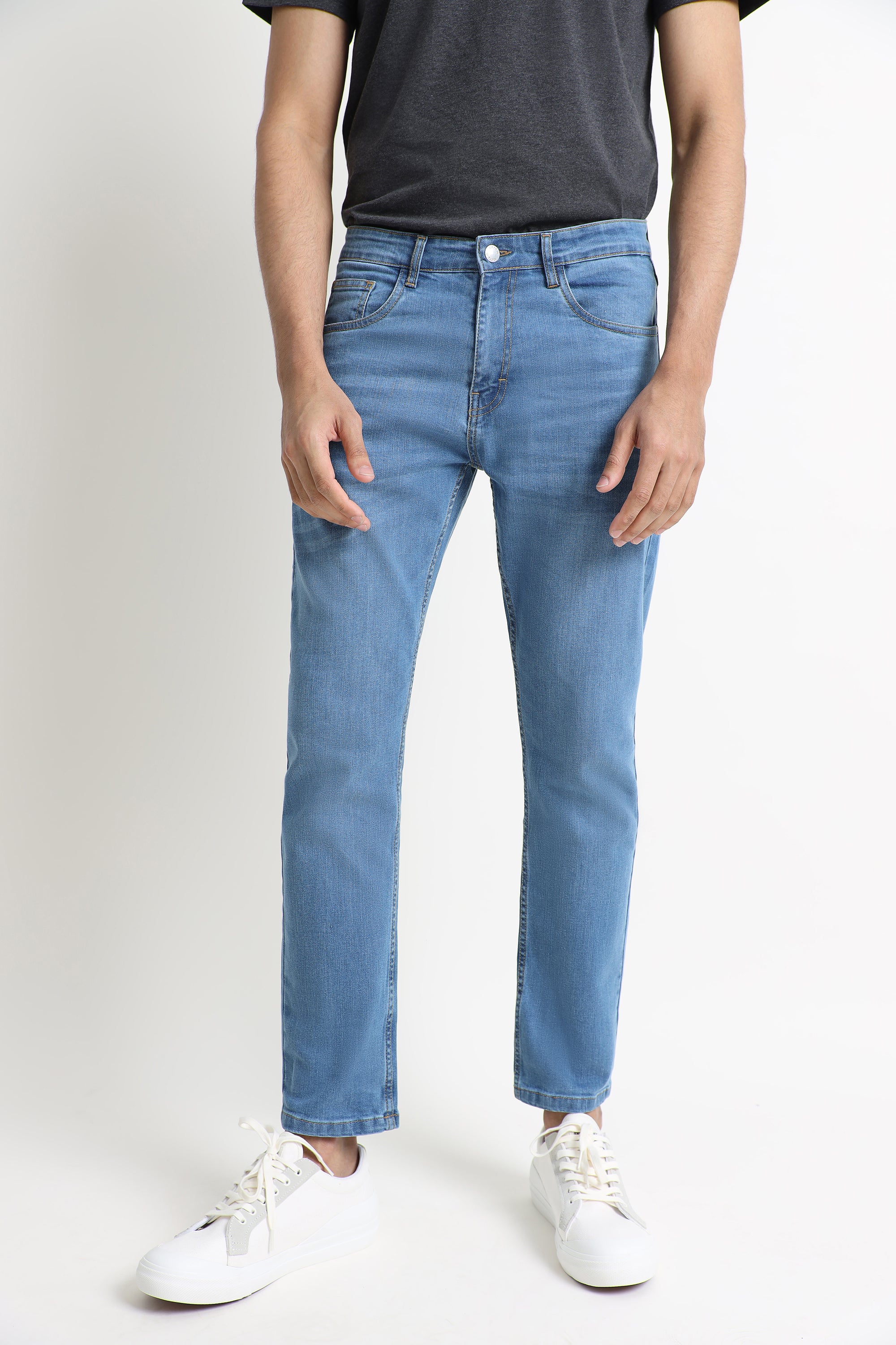 The Medium Wash Slim Fit Jeans –